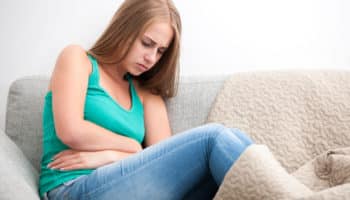 Почему возникают боли в животе на ранних сроках беременности